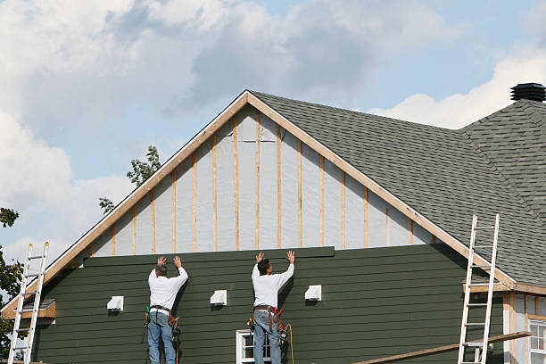 Professional Siding Contractor technician working in Boston, VA